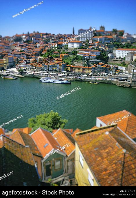View over the river Douro across to the historic centre of Porto, Portugal. The historic old town of Porto has been declared by UNESCO as a world heritage site