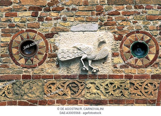 Pavone, relief on the facade of Pomposa Abbey, Codigoro, Emilia-Romagna, Italy
