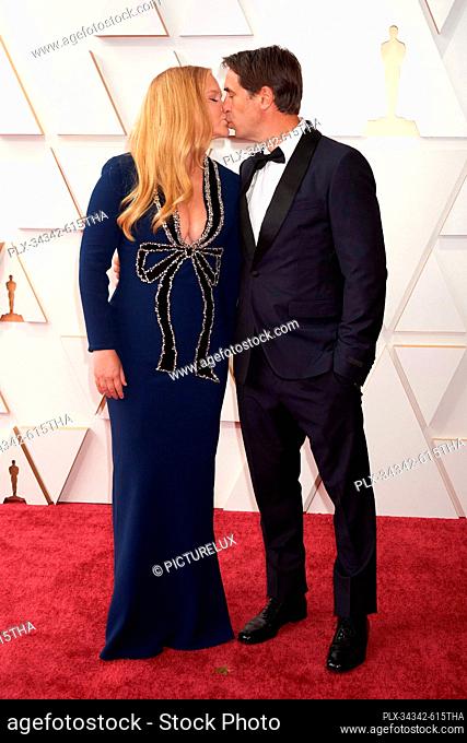 Co-host Amy Schumer and Chris Fischer arrive on the red carpet of the 94th Oscars® at the Dolby Theatre at Ovation Hollywood in Los Angeles, CA, on Sunday