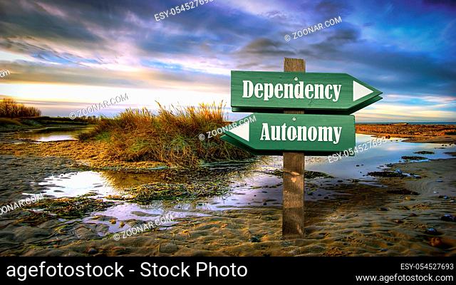 Street Sign the Direction Way to Autonomy versus Dependency