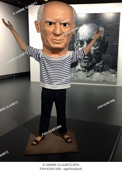 The figure 'Untitled Picasso' by New York-based Italian artist Maurizio Cattelan stands in front of a portrait of Picasso by Chinese painter Yan Pei-Ming in the...