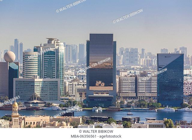 UAE, Dubai, Deira, Hilton Hotel, Emirates NBD bank and Dubai Chamber of Commerce buildings, elevated view