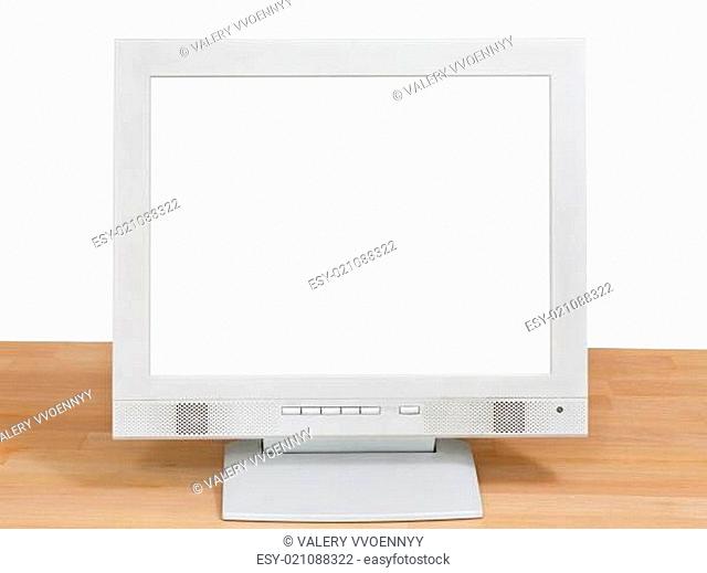 front view grey computer display on wooden table