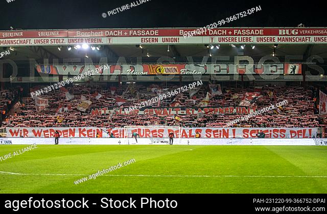 20 December 2023, Berlin: Soccer: Bundesliga, 1. FC Union Berlin - 1. FC Köln, Matchday 16, An der Alten Försterei. A Union fans' banner on the forest side...