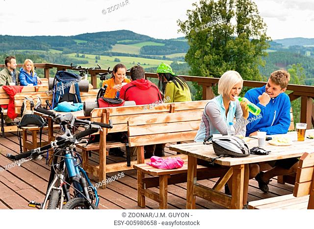 Young people relax mountain holiday summer sport
