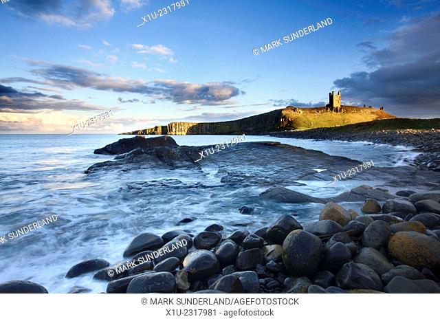 Dunstanburgh Castle at Sunset Northumberland Coast England