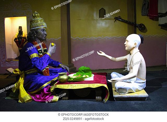 Saint Namdev offering prasad to Lord Vithoba, Hadshi Temple, Sant Darshan Museum, near tikona Vadgoan Maval, District Pune, Maharashtra, India