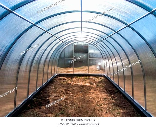 Greenhouse for vegetables. Polycarbonate greenhouse assembled from parts, prefabricated greenhouse