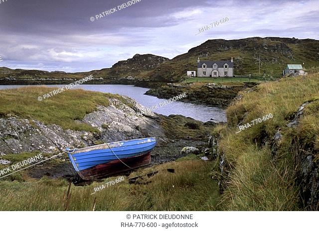 Blue boat and house, Ardslave, east coast of South Harris, Outer Hebrides, Scotland, United Kingdom, Europe, Europe