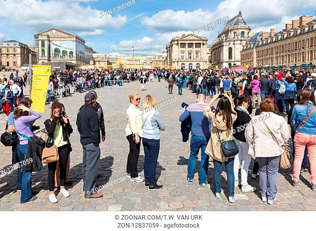 VERSAILLES PARIS, FRANCE - MAY 30: Long waiting queues of visitors on May 30, 2015 at the entrance of Palace of Versailles near Paris, France
