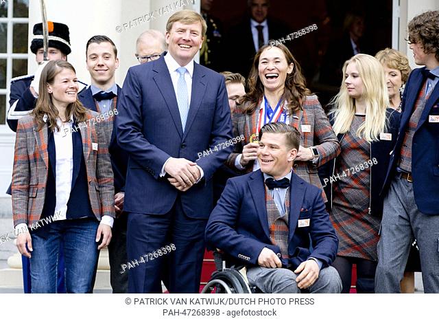 Dutch King Willem-Alexander (C), poses with Dutch participants of the Paralympic Games 2014 in Sochi, Bibian Mentel (Gold, Snowboard, 3rd R)