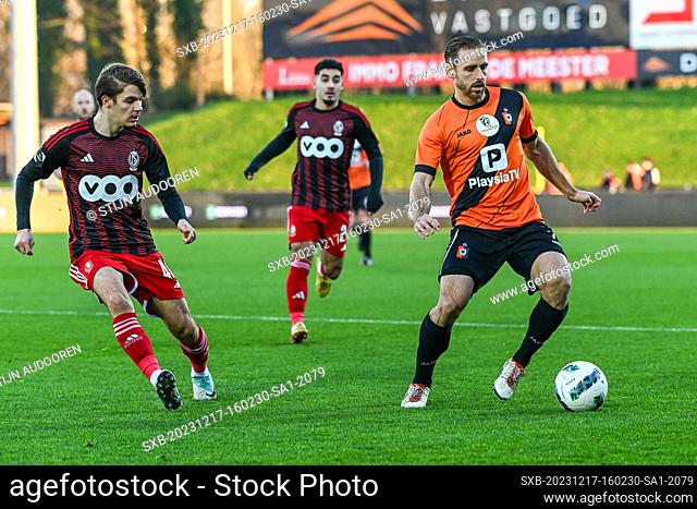 Berberi Rayan (46) of Standard SL16 FC and Alessio Staelens (7) of KMSK Deinze pictured during a soccer game between KMSK Deinze and SL16 FC during the 16th...