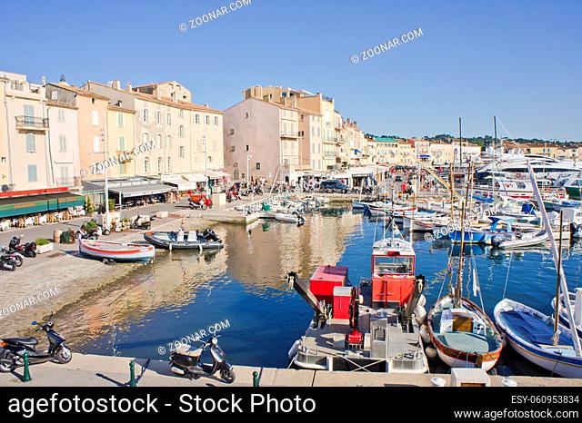 Saint Tropez, Old port view with fishing boats and colorful houses, Côte d'Azur. France, Europe