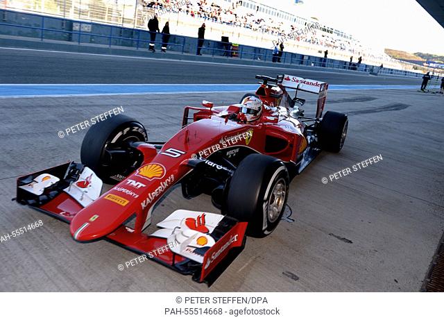 German Formula One driver Sebastian Vettel of Scuderia Ferrari steers the new SF15-T during the training session for the upcoming Formula One season at the...
