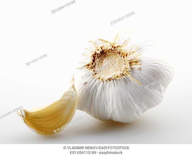 Close-Up Of Garlic Clove Against White Background