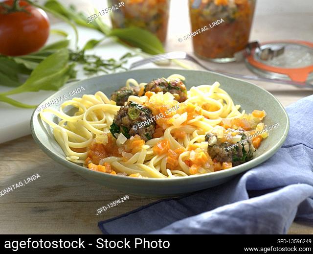 Wild garlic meatballs with tomato sauce with tagliatelle