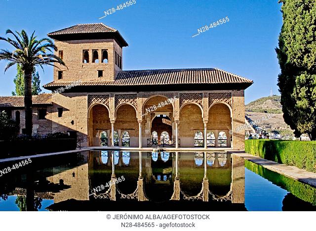 Pond and Ladies Tower. Palacio Nazarí. Partal Gardens. Alhambra. Granada. Andalucia. Spain