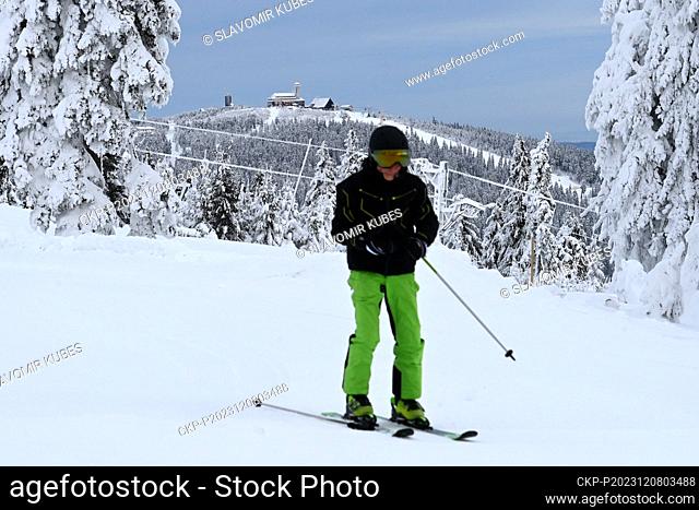 The first skiers on the top of Klinovec (1, 244 m) in the Klinovec ski resort, Karlovy Vary Region, Czech Republic, December 8, 2023