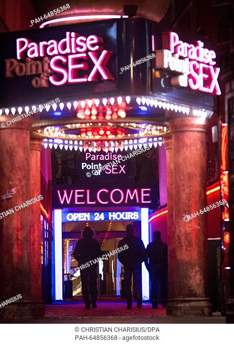 Three young men enter a brothel on the Reeperbahn street in Hamburg, Germany, 06 January 2016. A week following sexual assaults on women on New Year's Eve