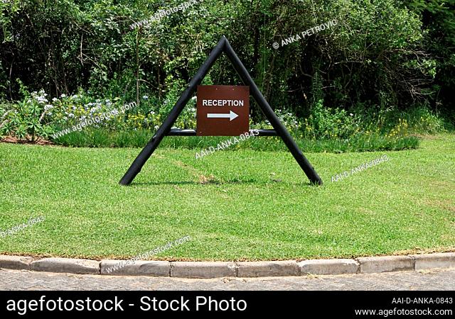 Sign pointing to reception in Sanbonani Resort, Hotel & Spa, Hazyview, Sabie River, Kruger National Park, Mpumalanga, South Africa