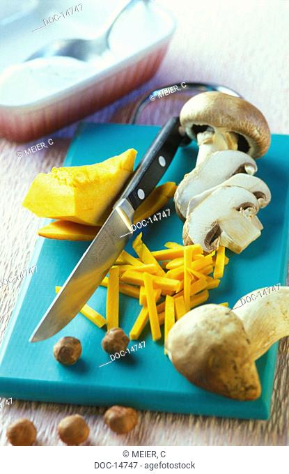 Mushroom Gratin pumpkin - dressing on blue Domestic kitchen board