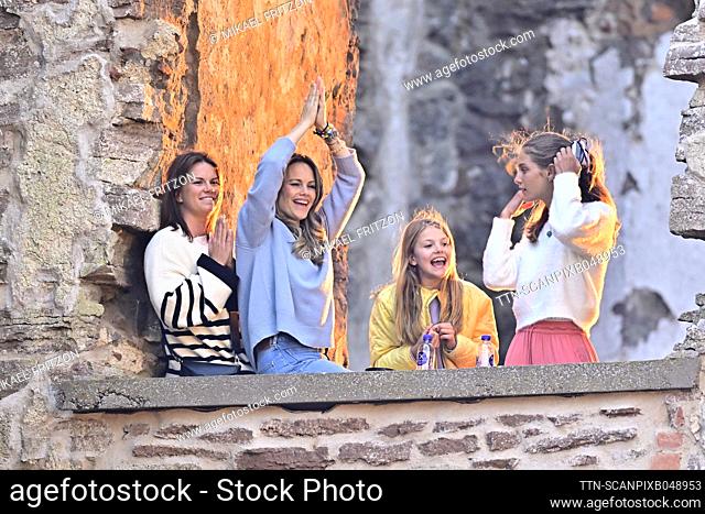 Princess Sophia and Princess Estelle with one of the daughters of Queen Silvia's nephew Patrick Sommerlath at a concert with Molly Sandén at Borgholm Castle...