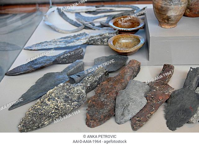 Collection of ancient spearheads and/or daggers and bowls, National Archeological Museum Djerdap, Kladovo, Serbia