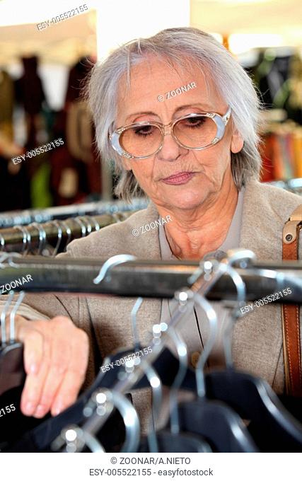 Elderly lady clothes shopping