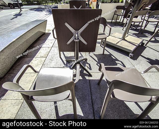 Foldable tabletop terrace tables. Terrace restaurant furniture concept