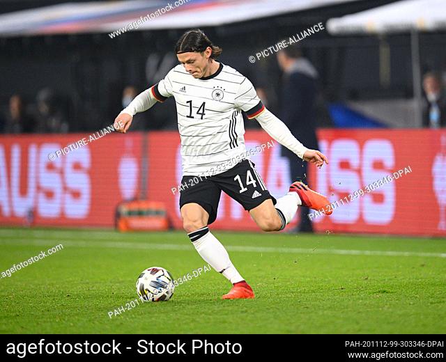 11 November 2020, Saxony, Leipzig: Football: international matches, Germany - Czech Republic, in the Red Bull Arena. Germany's Nico Schulz plays the ball