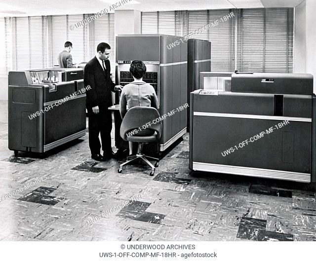 New York: 1954. A woman working at an IBM 650 Data Processing System, the first mass produced computer. IBM sold 450 of them the first year