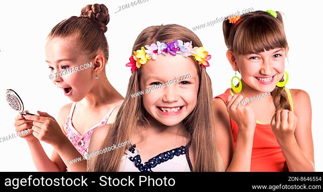Group of little happy girls isolated in white background