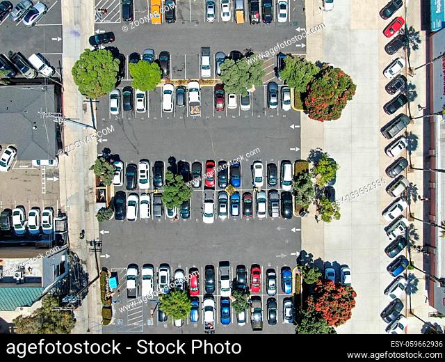 Aerial top view of parking lot with varieties of colored vehicles. Pacific Beach. California