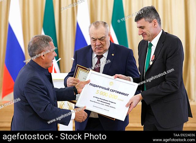 RUSSIA, KAZAN - MAY 20, 2023: Tatarstan's head Rustam Minnikhanov, BC UNICS Kazan president Yevgeny Bogachev and BC UNICS Kazan's head coach Velimir Perasovic...