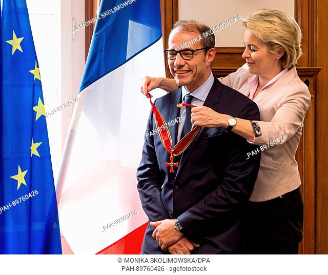 German federal minister of defence, Ursula von der Leyen awards the Order of Merit of the Federal Republic of Germany to Philippe Errera