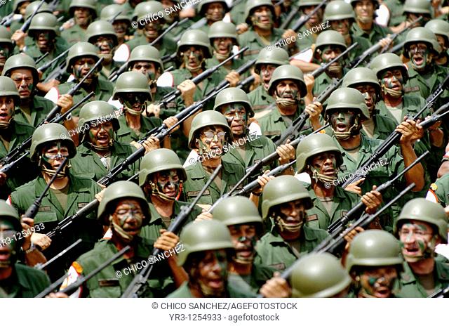 Army reservists march in a military parade in Valencia, Venezuela