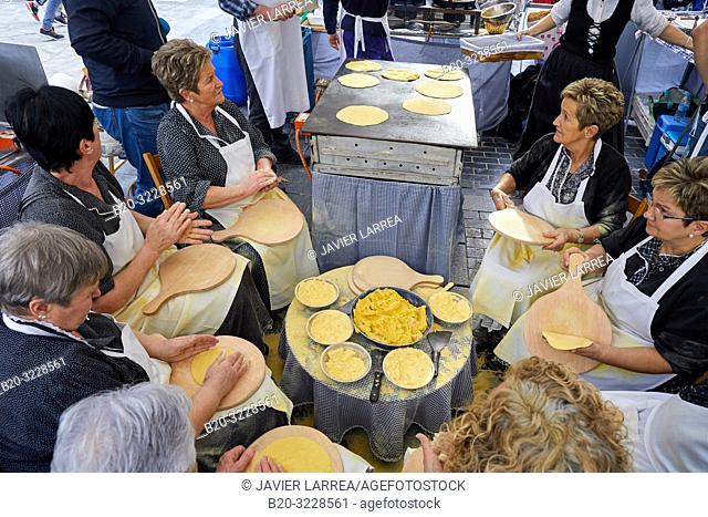 Elaboration of Talos (Cakes with corn flour), People dressed in typical baserritarra clothes, Fair of Santo Tomas, Donostia, San Sebastian, Gipuzkoa