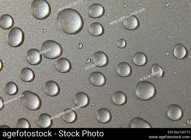 Abstract water drops on grey silver background, macro, Bubbles close up, Cosmetic liquid drops, Flat lay pattern