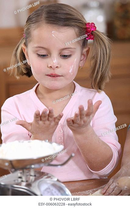 Young child baking