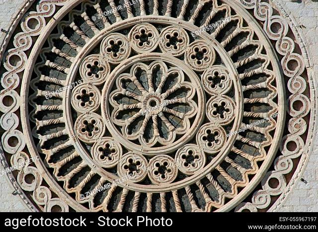Rosette in front of the saint Francis sanctuary in Assisi, Italy