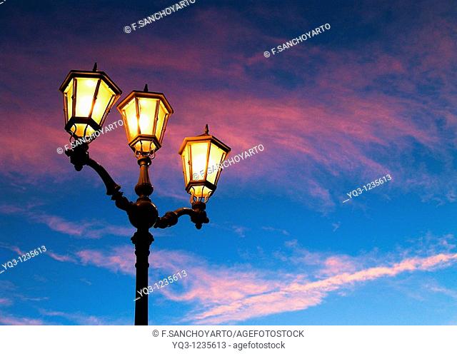 Street lamps in the early morning. Port of Castro Urdiales , Cantabria, Spain