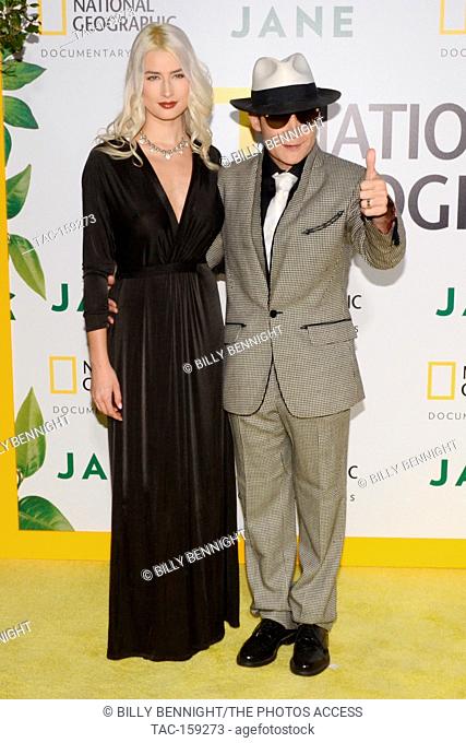 Model Courtney Anne Mitchell and Actor Corey Feldman arrives at the Los Angeles Premiere of National Geographic Documentary Films' ""Jane"" at the Hollywood...