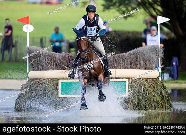18 September 2021, North Rhine-Westphalia, Aachen: CHIO, Eventing, Cross-Country competition: The rider Andreas Ostholt from Germany on his horse ""Corvette""...