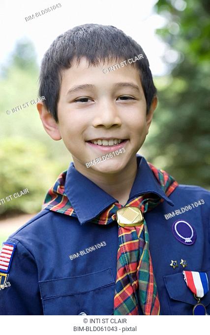 Asian boy wearing uniform