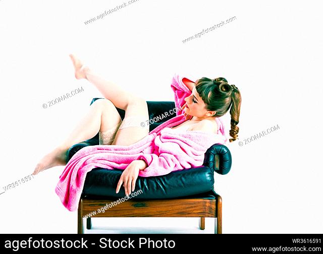 young girl in fifties pin-up style with pink bathrobe