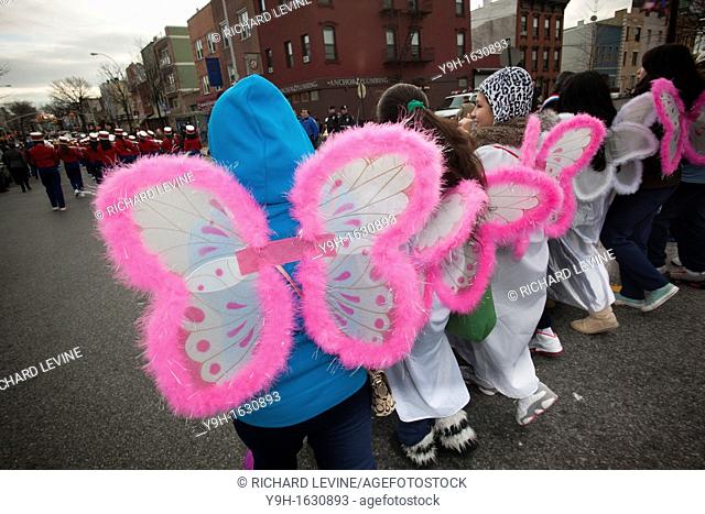 Paraders march in the annual Three Kings Day Parade in the Bushwick neighborhood of Brooklyn on Sunday, January 8, 2012 Neighborhood school children marched...