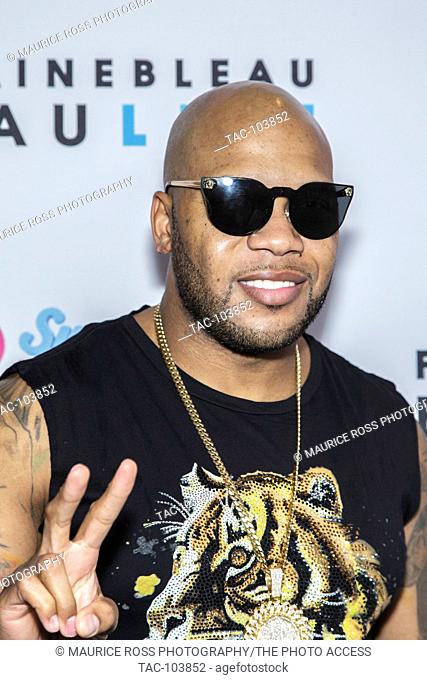 Flo Rida arrives on the blue carpet at the iHeart Radio Summer Pool Party at the Fountainebleau's Bleaulive on May 21, 2016 in Miami Beach, Florida