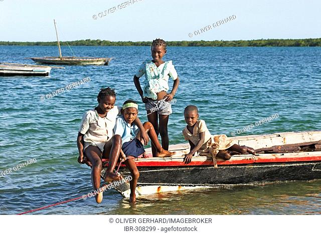 Children on a boat at Ibo Island, Quirimbas islands, Mozambique, Africa