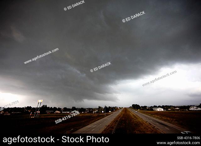 Interstate highway and frontage road during a dangerous thunderstorm, Colorado, USA