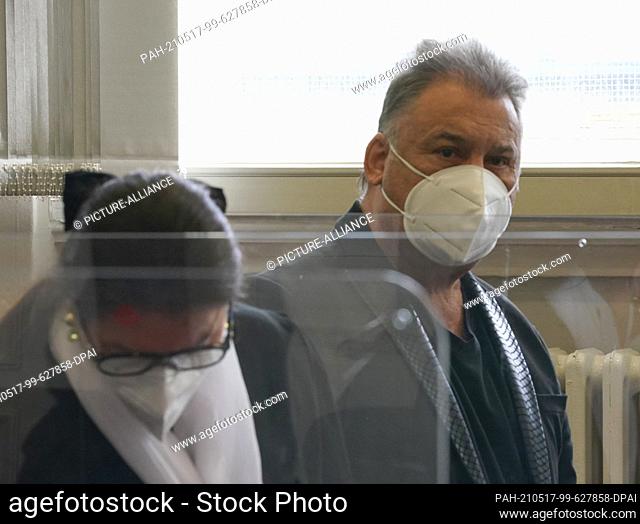 17 May 2021, Hamburg: The defendant ""Billion Mike"" stands next to his lawyer Jutta Heck at the beginning of the trial in the courtroom